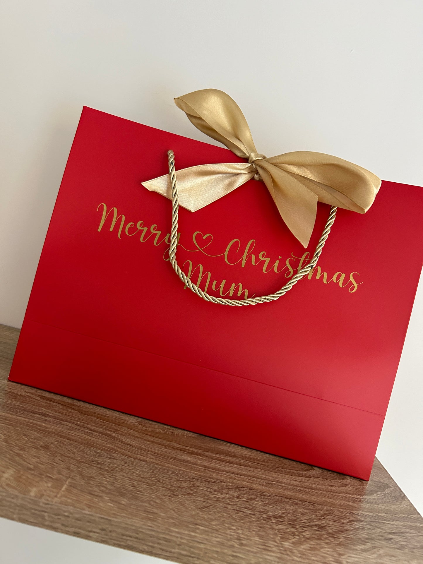 Red Gift Bag With Gold Bow