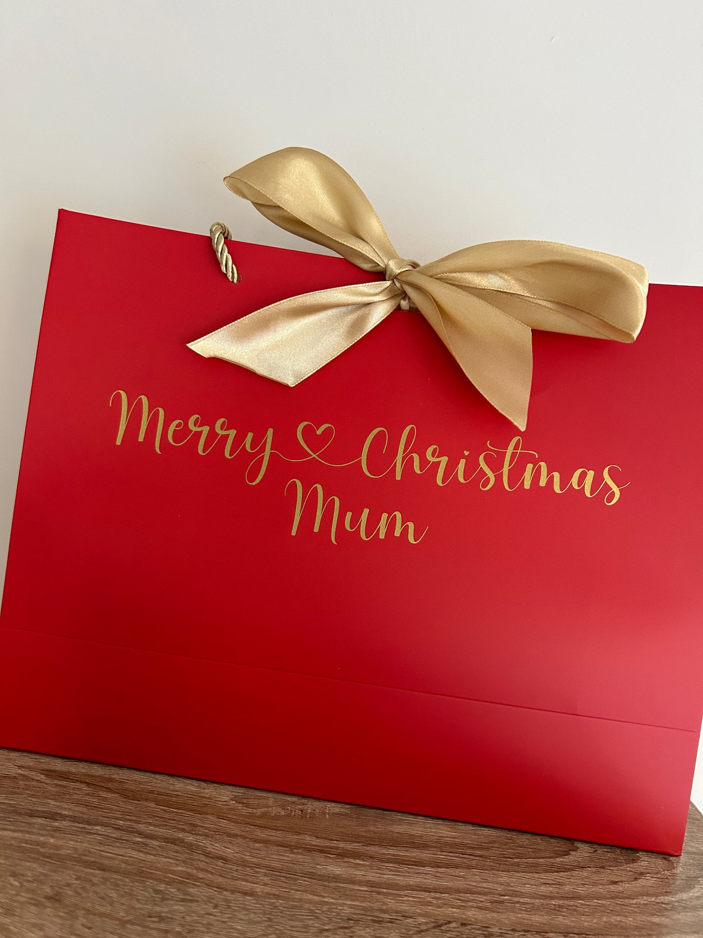 Red Gift Bag With Gold Bow